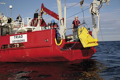A sub-bottom profiler is lifted back on board of the survey vessel Triad