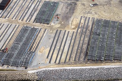 Aerial view of pipe joints stored at stock yard Mukran, Germany