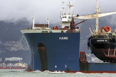 Carrier vessel Hawk transports the Castoro Dieci through the Strait of Gibraltar